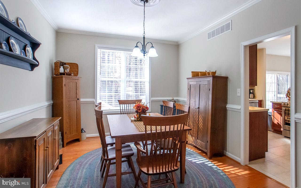 1 Lynn Ridge Court Manchester, MD 21102 - Photo 18 of 63 Dining Room with Chair Rail, Hardwood Floors