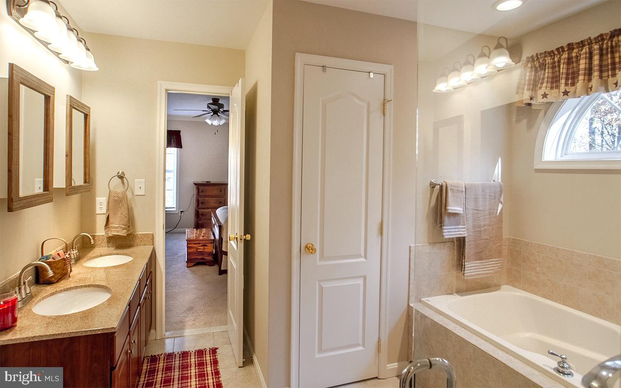 1 Lynn Ridge Court Manchester, MD 21102 - Photo 29 of 63 Primary Bath Suite w Ceramic Tile Flooring