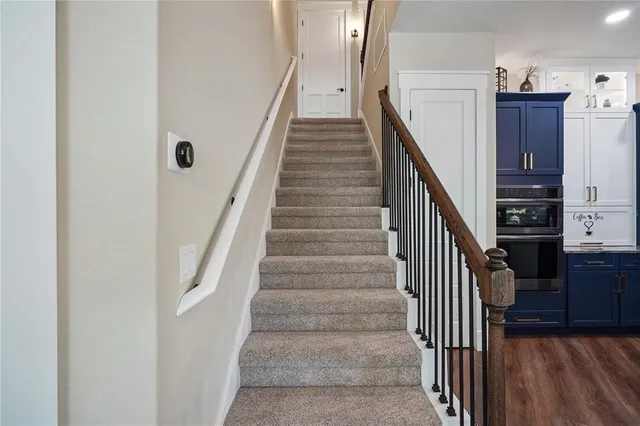 a bedroom with a bed and a table