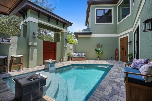 an aerial view of lake residential house with outdoor space and river