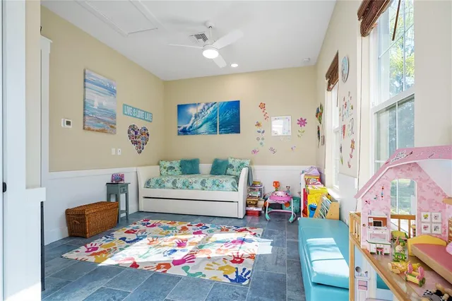 an aerial view of a house with outdoor space