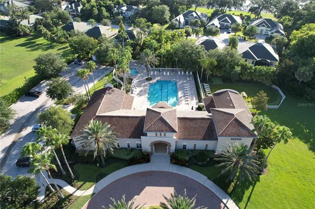 a view of an house with backyard space and garden