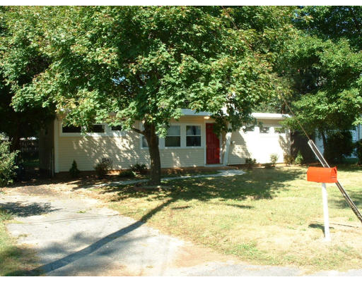 140 Groton Street Springfield, MA 01129 - Photo 1 of 8 a view of a yard with plants and large trees
