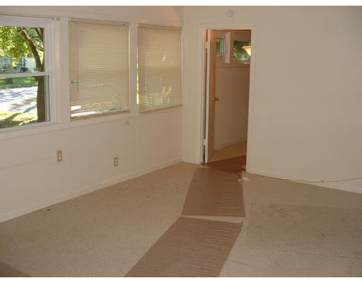 140 Groton Street Springfield, MA 01129 - Photo 4 of 8 an empty room with windows