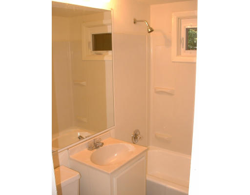 140 Groton Street Springfield, MA 01129 - Photo 5 of 8 a bathroom with a sink and a mirror