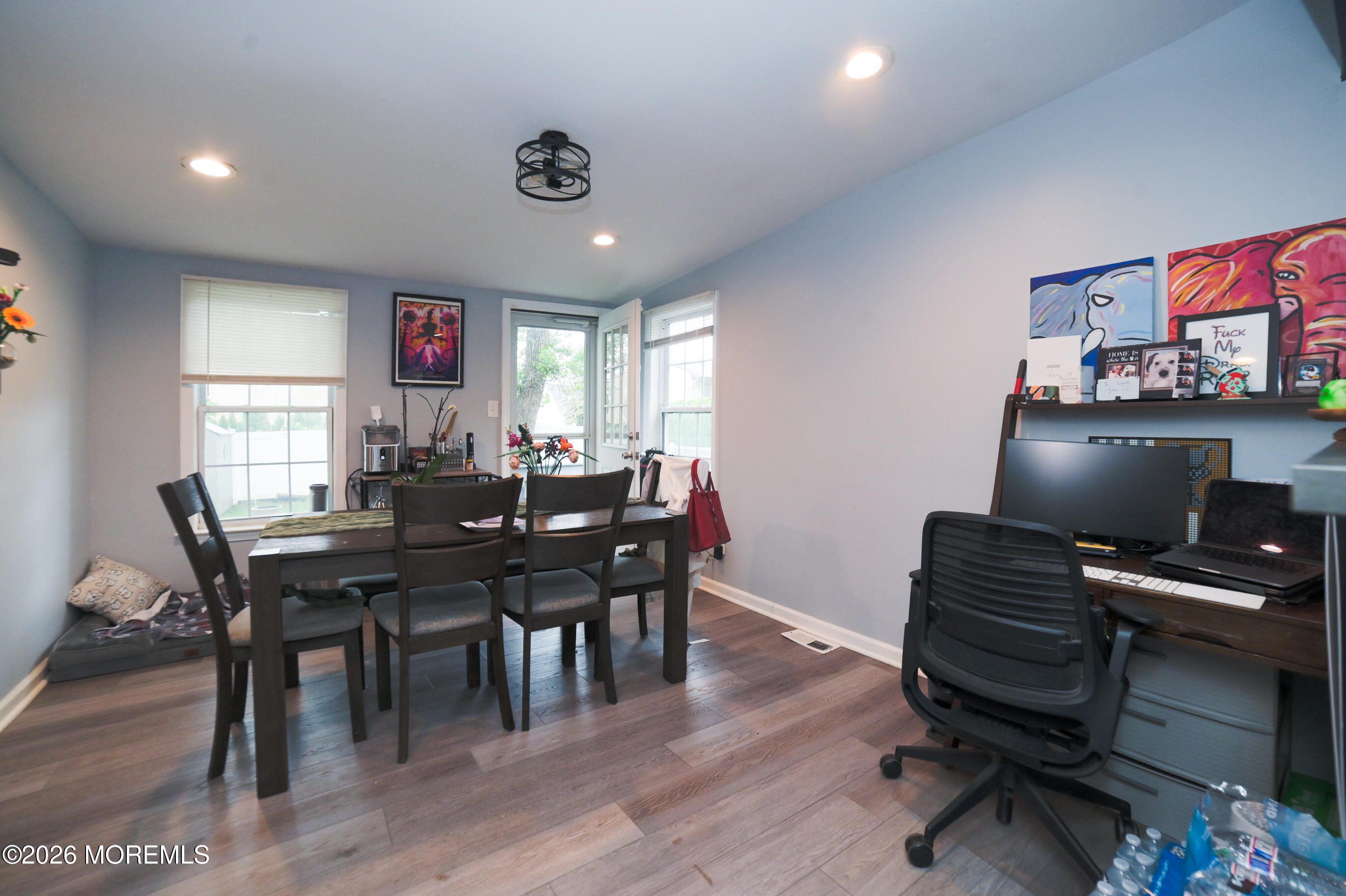 501 Gulden Street Keyport, NJ 07735 - Photo 8 of 14 a view of a workspace with furniture and wooden floor