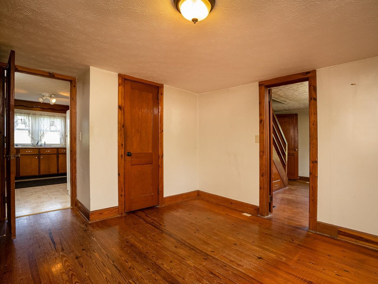 3697 Oak Ridge Road Mount Crawford, VA 22841 - Photo 15 of 34 wooden floor in an empty room with a window