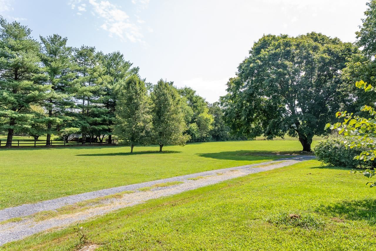 3697 Oak Ridge Road Mount Crawford, VA 22841 - Photo 22 of 34 a view of a golf course with a lake