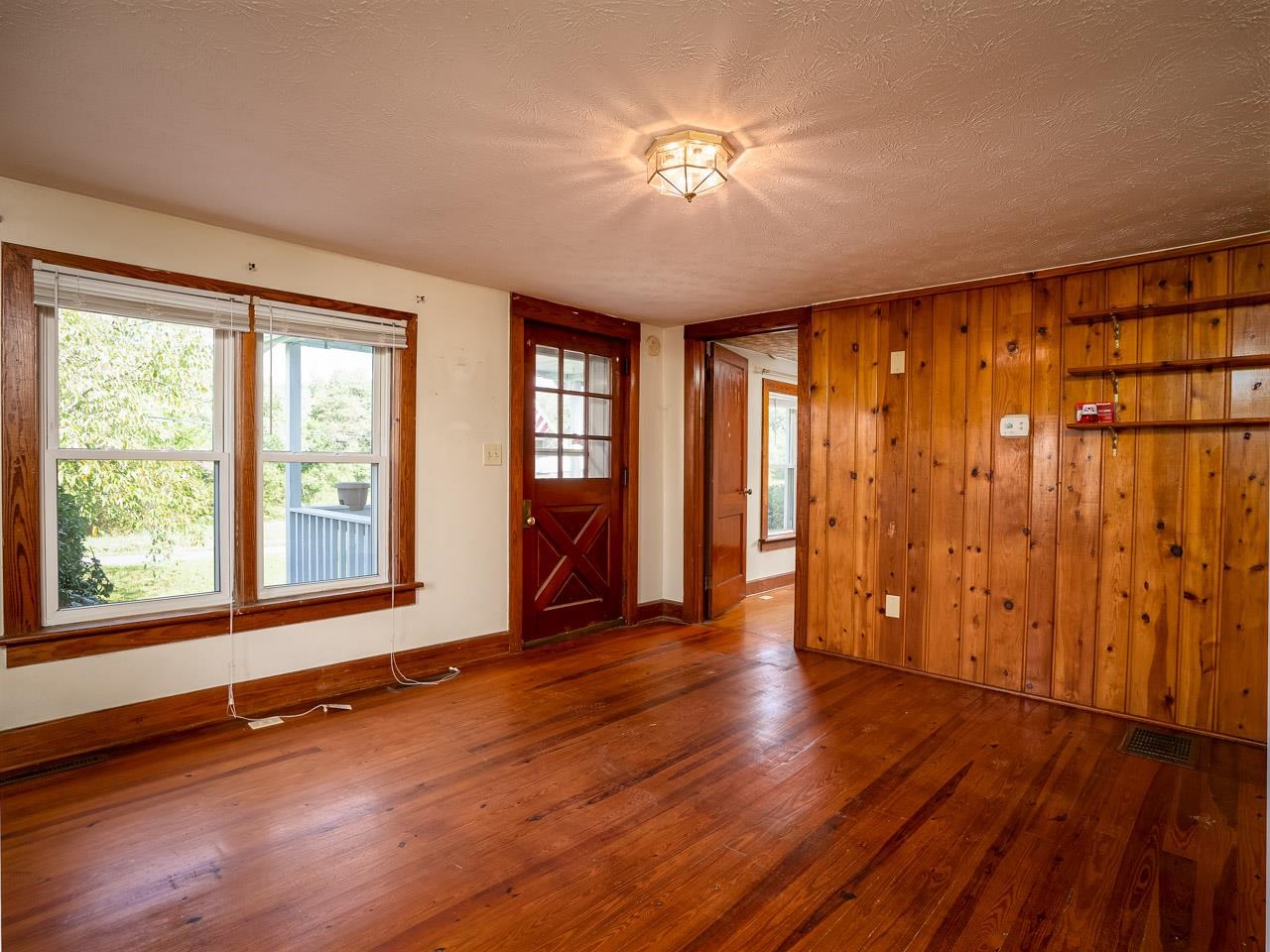 3697 Oak Ridge Road Mount Crawford, VA 22841 - Photo 6 of 34 a view of an empty room with a window and wooden floor