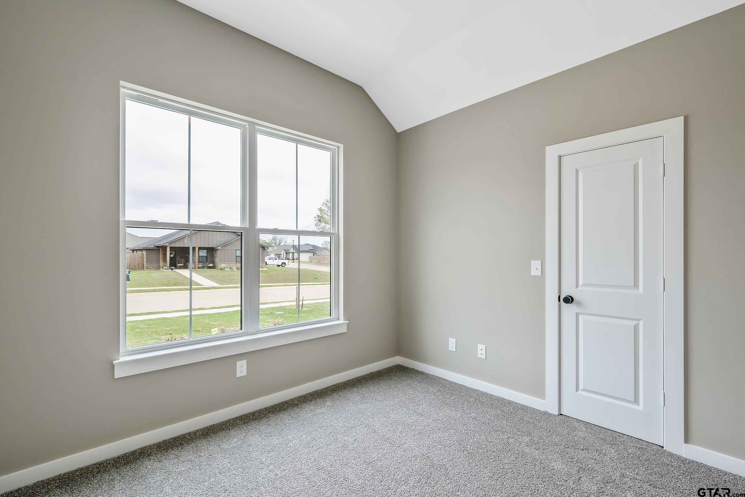 16218 Crossing Circle Lindale, TX 75771 - Photo 14 of 24 a view of an empty room with a window