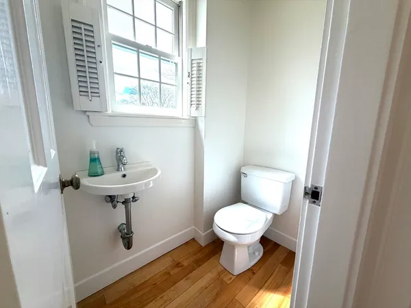 a bathroom with a sink toilet