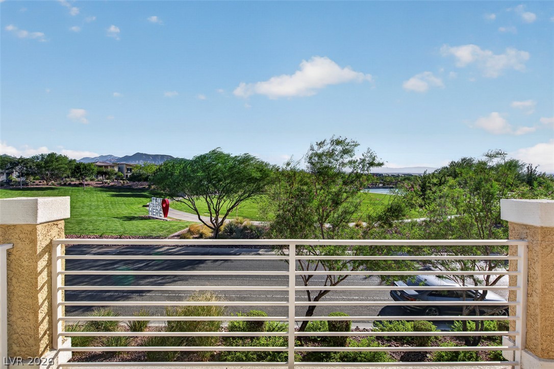 1100 East Sunset Road Henderson, NV 89011 - Photo 47 of 58 Vast green spaces and distant lake views provide a serene and picturesque backdrop for this property.