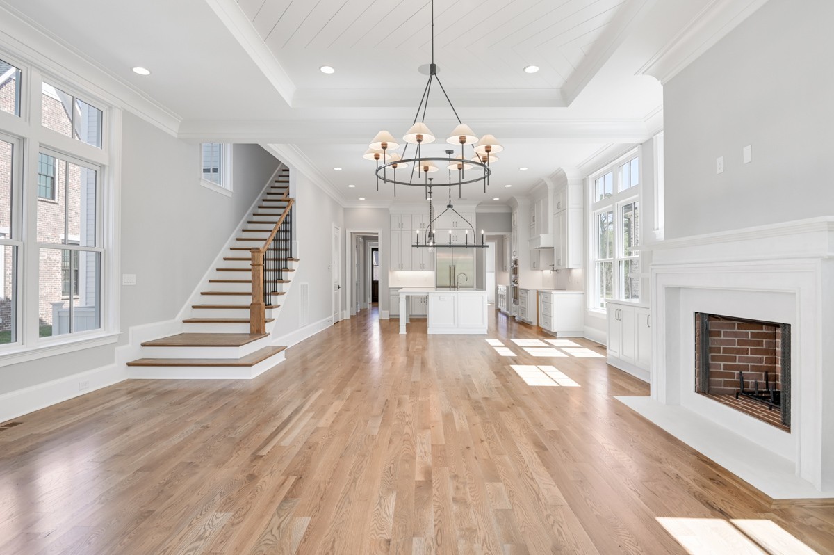 191 Splendor Ridge Drive Franklin, TN 37064 - Photo 17 of 70 a view of a room with wooden floor fireplace and windows