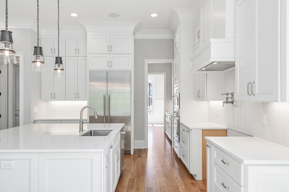 191 Splendor Ridge Drive Franklin, TN 37064 - Photo 24 of 70 a bathroom with a double vanity sink a mirror and a shower