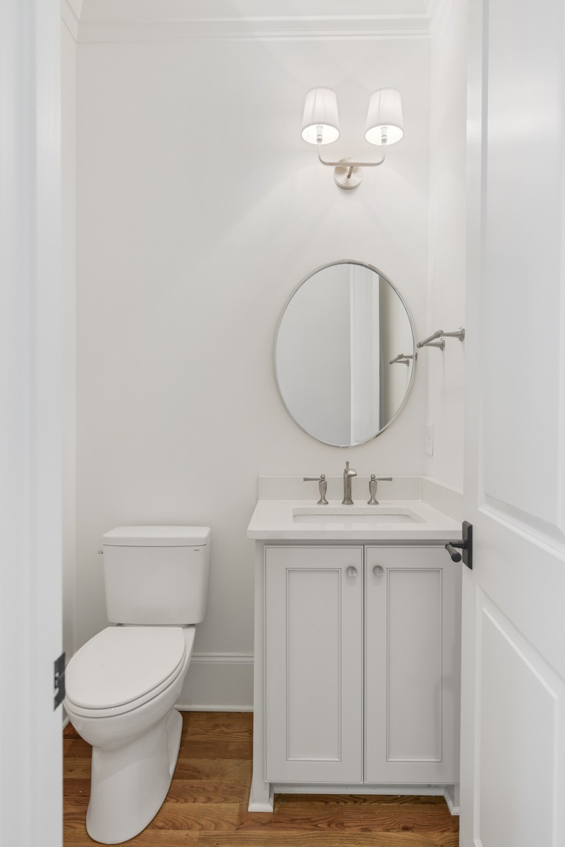 191 Splendor Ridge Drive Franklin, TN 37064 - Photo 31 of 70 a bathroom with a toilet a sink and mirror