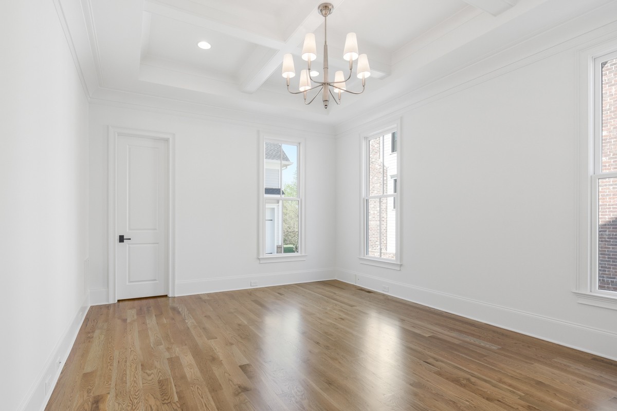 191 Splendor Ridge Drive Franklin, TN 37064 - Photo 32 of 70 an empty room with wooden floor chandelier and windows