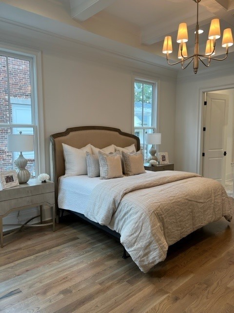 191 Splendor Ridge Drive Franklin, TN 37064 - Photo 33 of 70 a bedroom with a bed and wooden floor