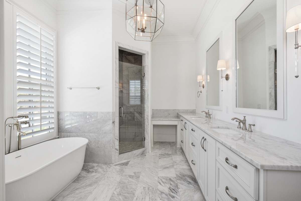 191 Splendor Ridge Drive Franklin, TN 37064 - Photo 34 of 70 a bathroom with a granite countertop sink a toilet and bathtub