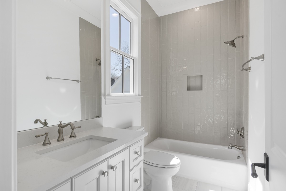 191 Splendor Ridge Drive Franklin, TN 37064 - Photo 46 of 70 a bathroom with a sink a toilet and shower