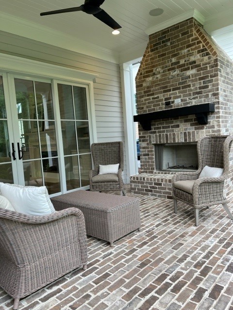 191 Splendor Ridge Drive Franklin, TN 37064 - Photo 62 of 70 a bedroom with furniture and a fireplace