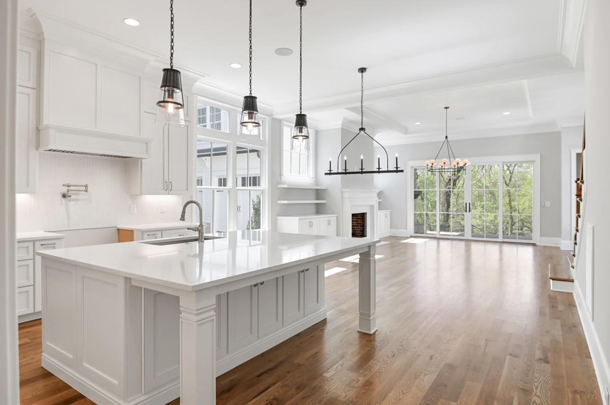 191 Splendor Ridge Drive Franklin, TN 37064 - Photo 9 of 70 a kitchen with stainless steel appliances granite countertop a sink a oven a stove and a wooden floors