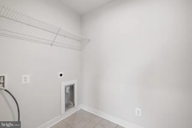 a view of a hallway with closet