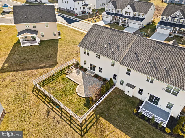 an aerial view of residential house with outdoor space