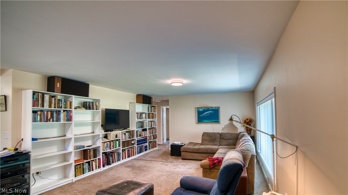 160 Welton Road Conneaut, OH 44030 - Photo 10 of 16 Living room featuring light colored carpet