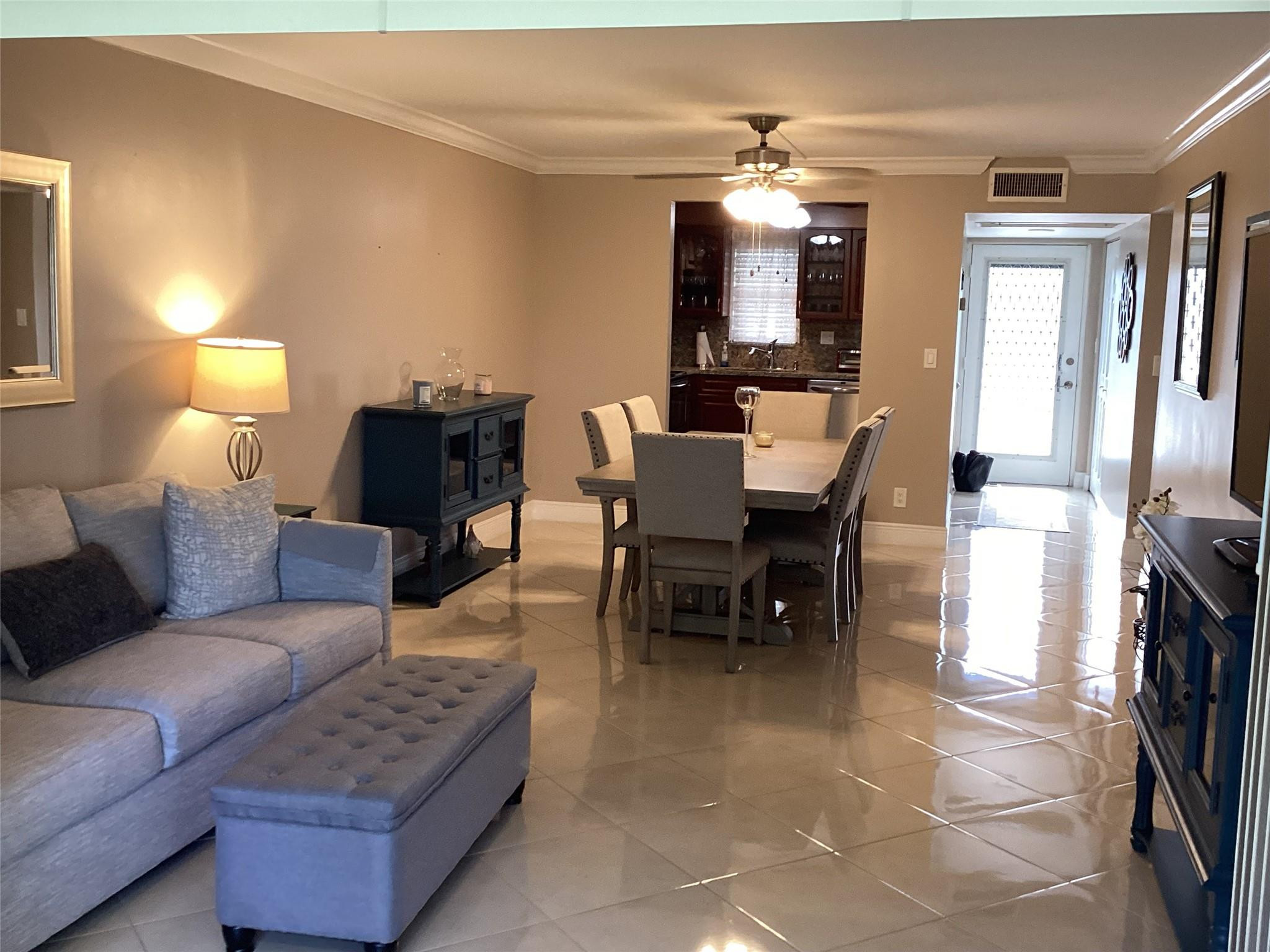 9233 Southwest 8th Street, Unit 209 Boca Raton, FL 33428 - Photo 1 of 16 LIVING/ DINING ROOM