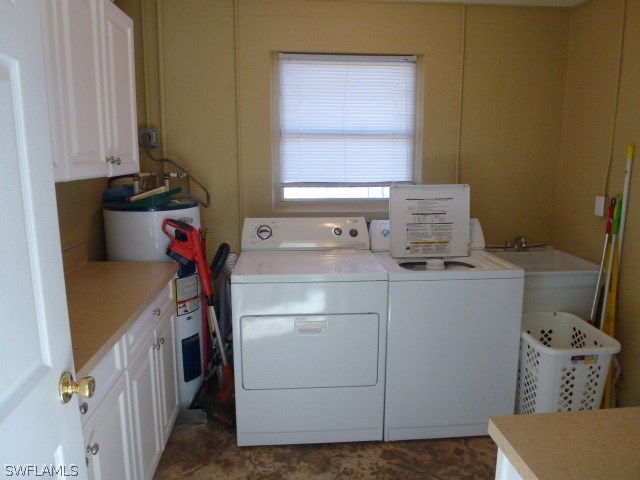 1450 Mandel Road Fort Myers, FL 33919 - Photo 15 of 18 a utility room with dryer and washer
