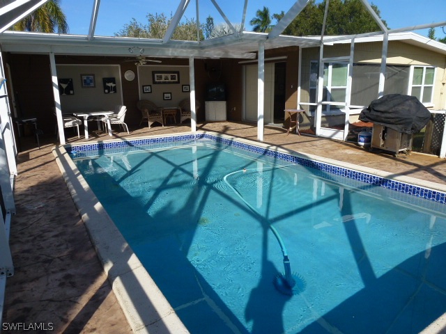 1450 Mandel Road Fort Myers, FL 33919 - Photo 18 of 18 a view of house with outdoor seating space