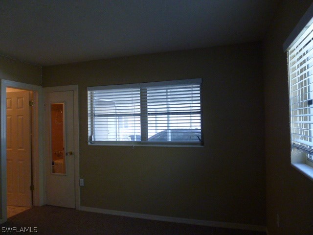 1450 Mandel Road Fort Myers, FL 33919 - Photo 7 of 18 a view of an empty room with a window