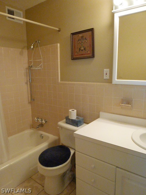 1450 Mandel Road Fort Myers, FL 33919 - Photo 8 of 18 a bathroom with a sink a toilet and bathtub