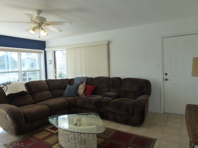 1450 Mandel Road Fort Myers, FL 33919 - Photo 9 of 18 a living room with furniture and a large window