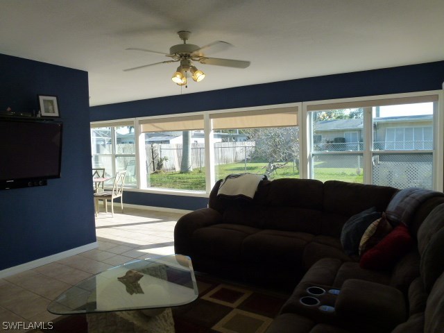 1450 Mandel Road Fort Myers, FL 33919 - Photo 10 of 18 a living room with furniture and a flat screen tv