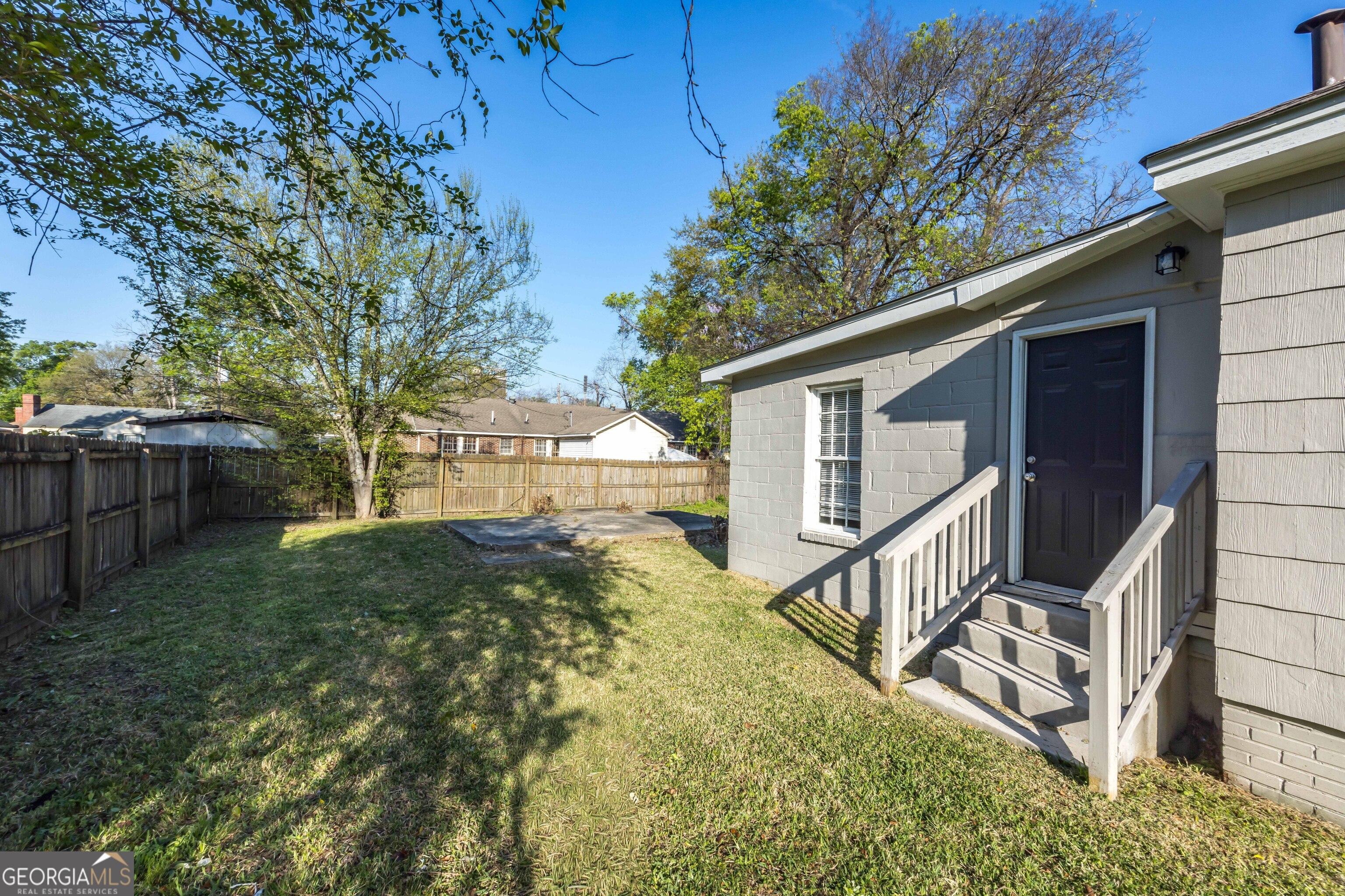 1103 Bryan Avenue Columbus, GA 31906 - Photo 16 of 24 a view of a house with backyard and sitting area