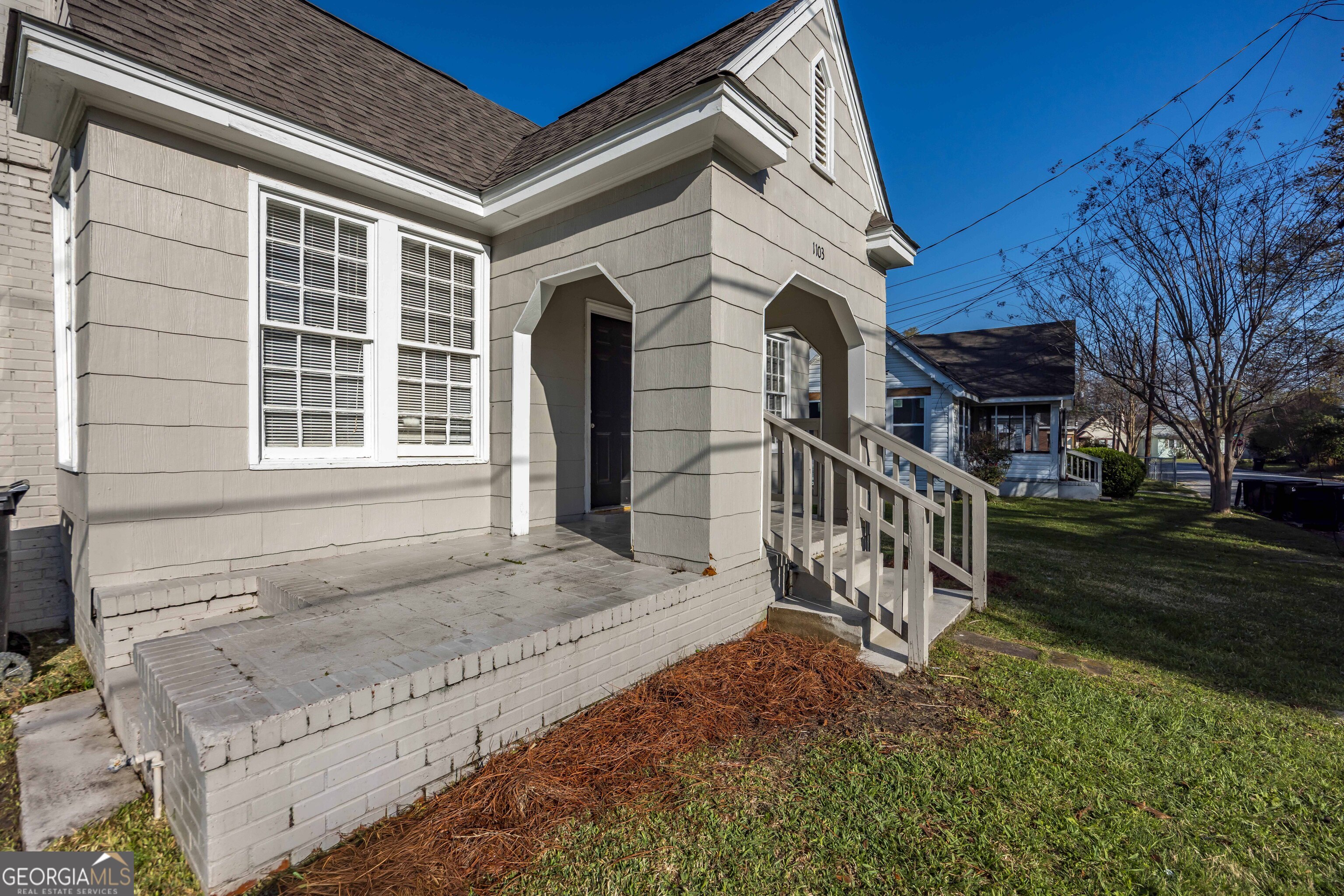 1103 Bryan Avenue Columbus, GA 31906 - Photo 23 of 24 a front view of a house with a yard