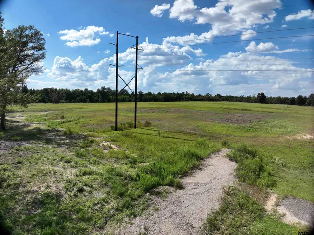 a view of a lake with a big yard