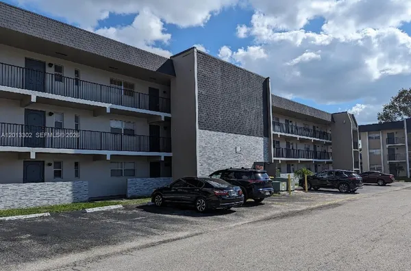 a car parked in front of a building