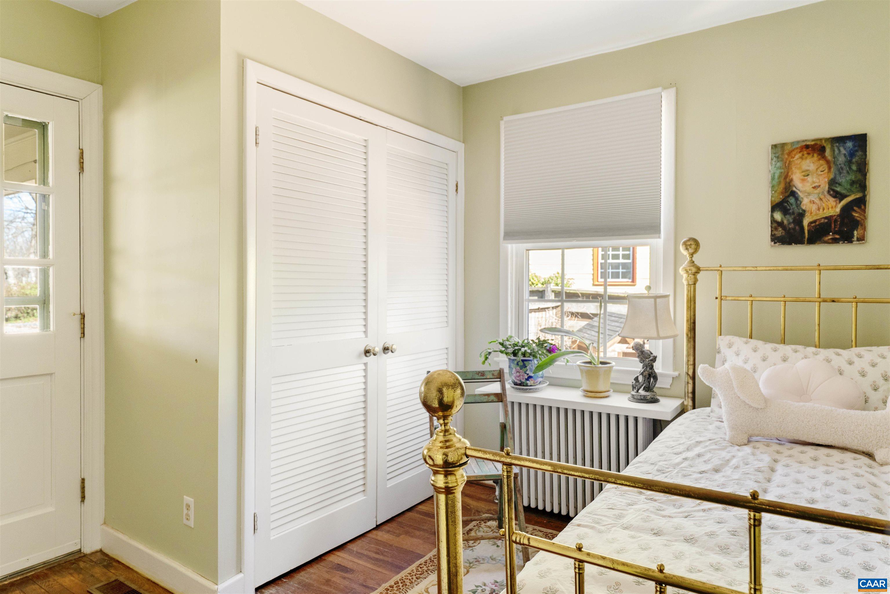 1618 Greenleaf Lane Charlottesville, VA 22903 - Photo 18 of 37 a bedroom with furniture and a window