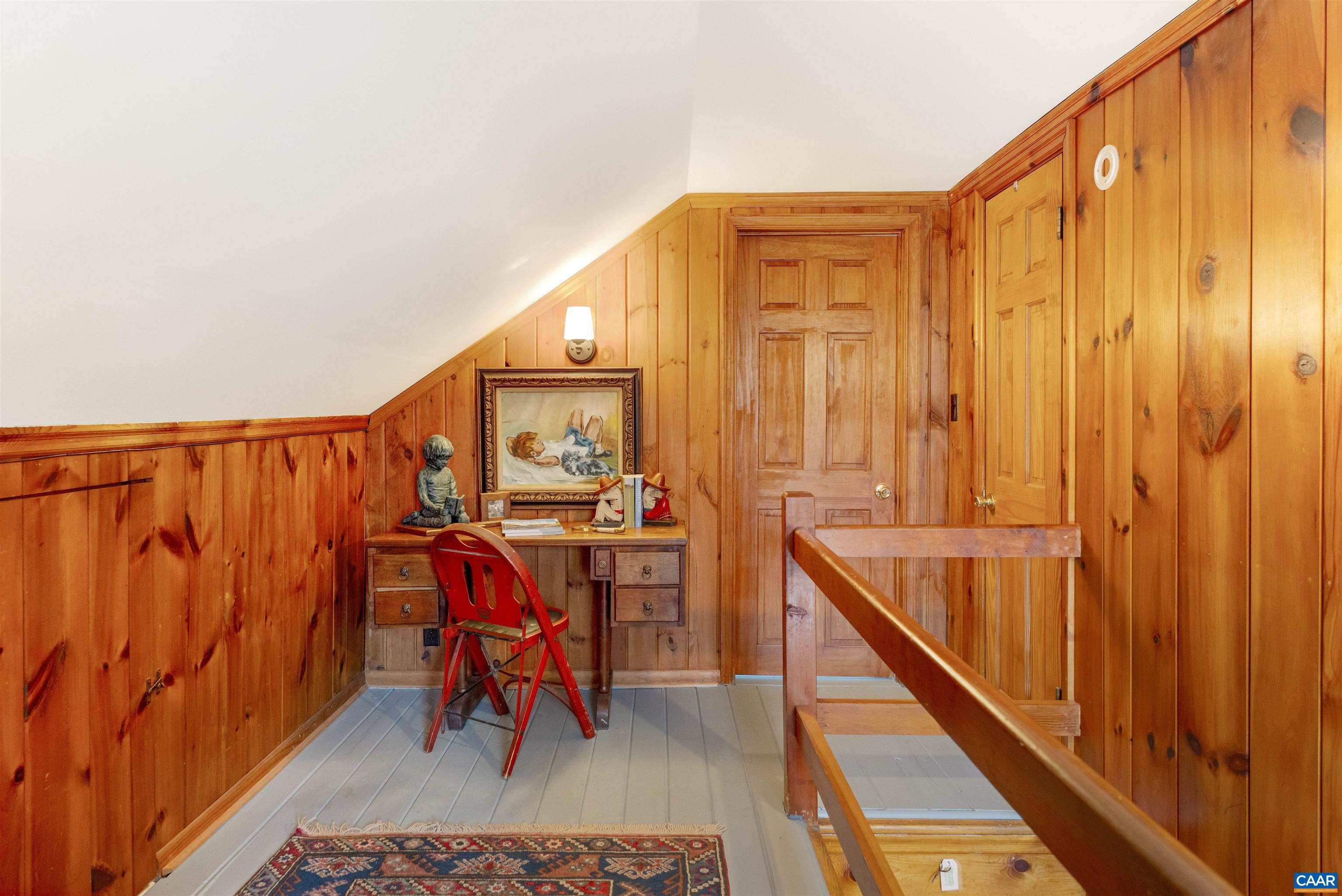 1618 Greenleaf Lane Charlottesville, VA 22903 - Photo 20 of 37 a very nice looking room with a furniture and staircase