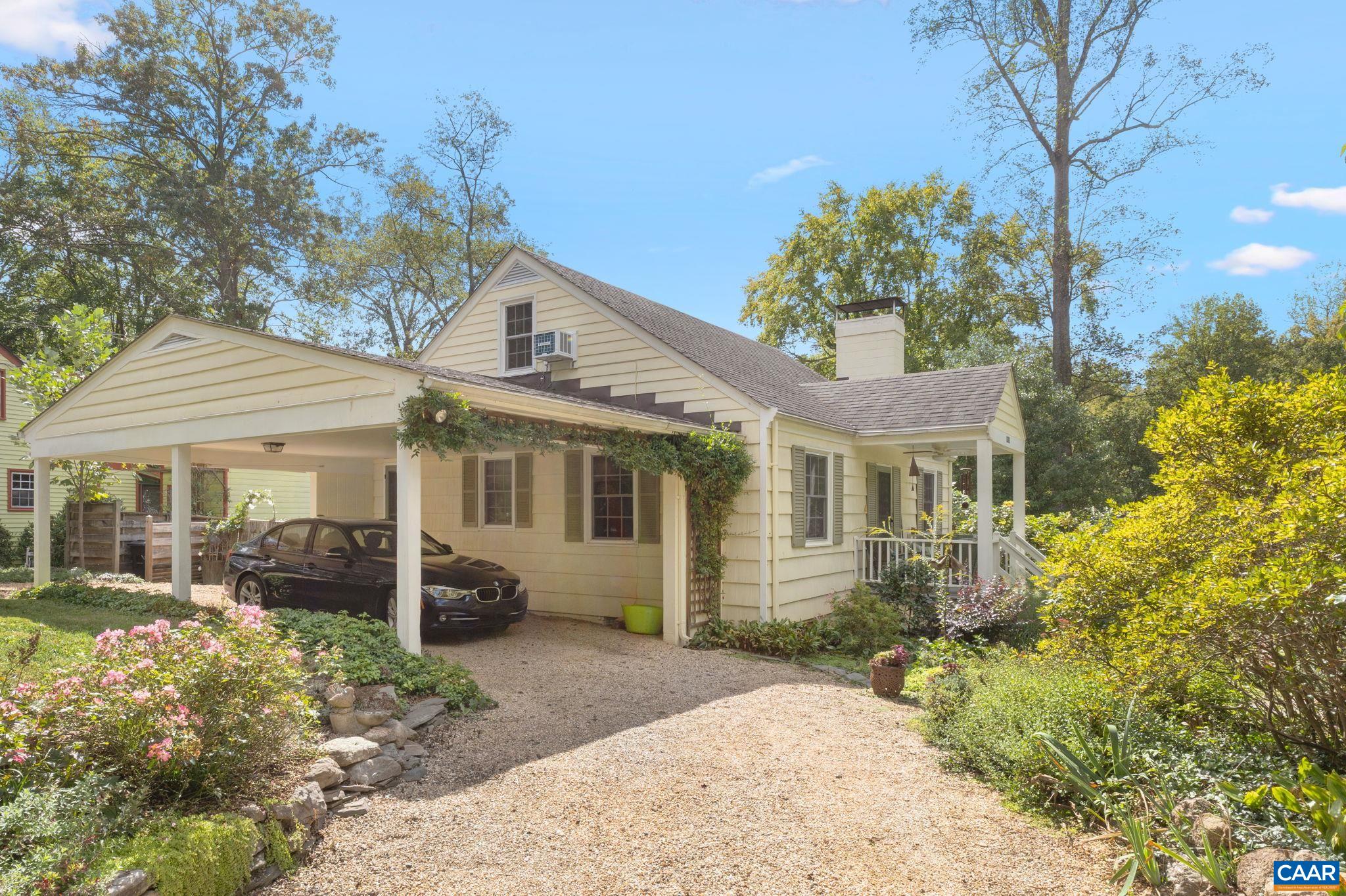 1618 Greenleaf Lane Charlottesville, VA 22903 - Photo 2 of 37 a front view of a house with garden