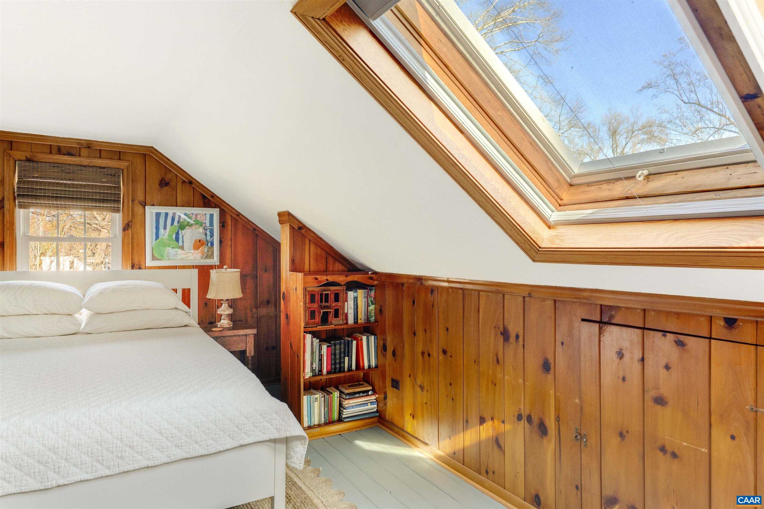 1618 Greenleaf Lane Charlottesville, VA 22903 - Photo 22 of 37 a view of a hallway with furniture and stairs