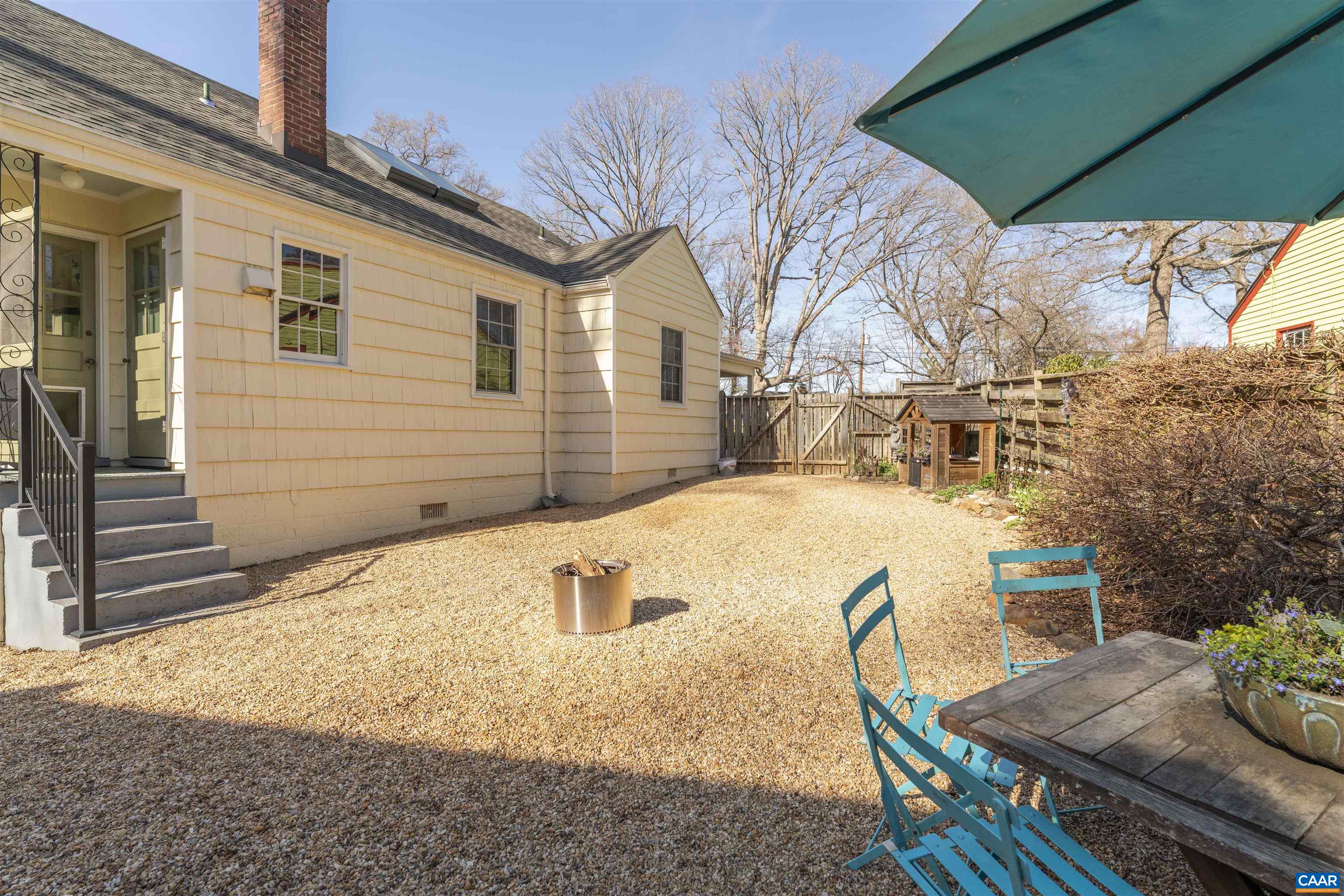 1618 Greenleaf Lane Charlottesville, VA 22903 - Photo 26 of 37 a view of backyard with swimming pool and seating space