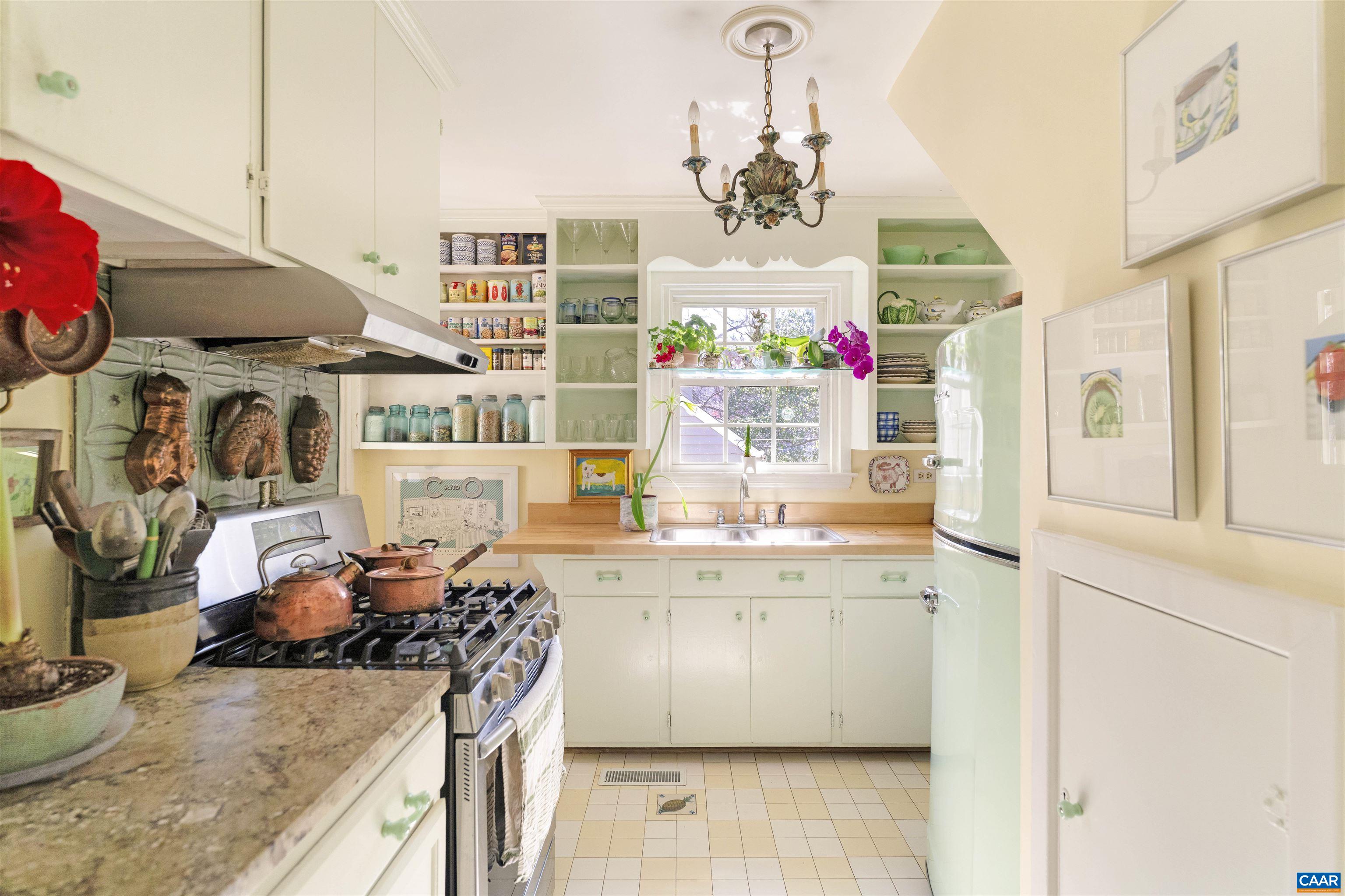 1618 Greenleaf Lane Charlottesville, VA 22903 - Photo 10 of 37 a kitchen with a sink stove and cabinets