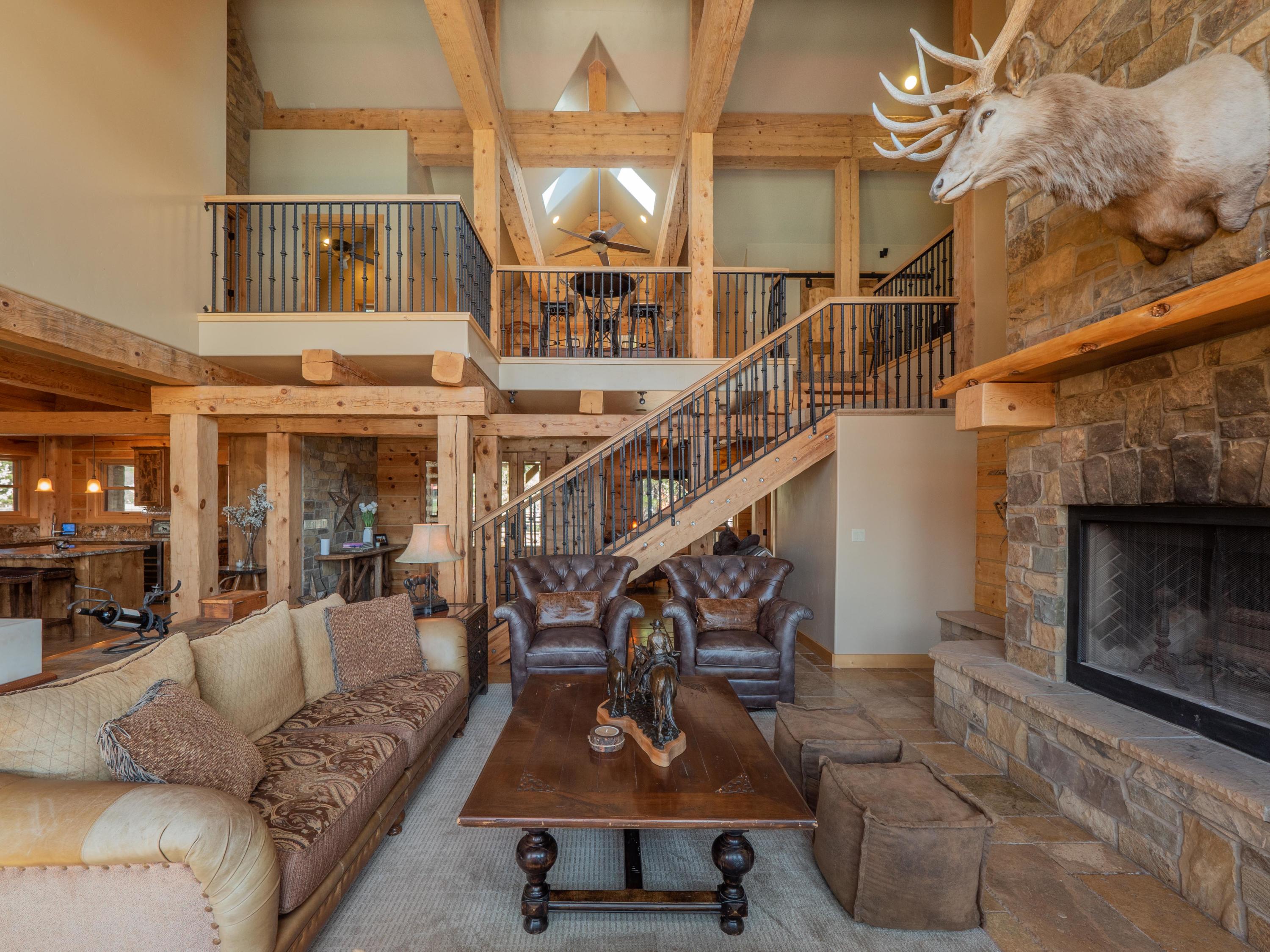 40900 Brown Road Fall River Mills, CA 96028 - Photo 11 of 72 a view of a livingroom with furniture and a floor to ceiling window