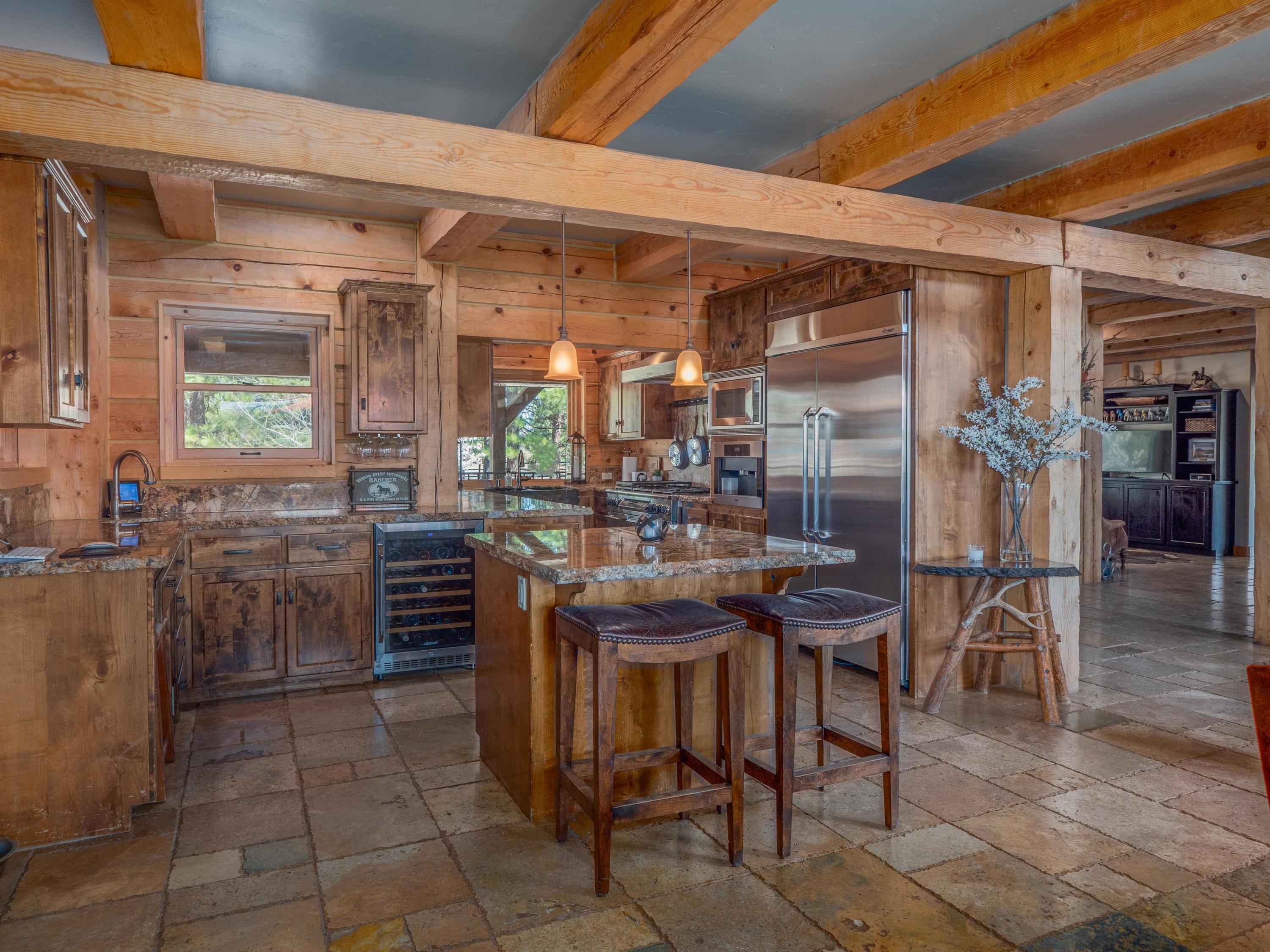 40900 Brown Road Fall River Mills, CA 96028 - Photo 17 of 72 a kitchen with a table and chairs in it