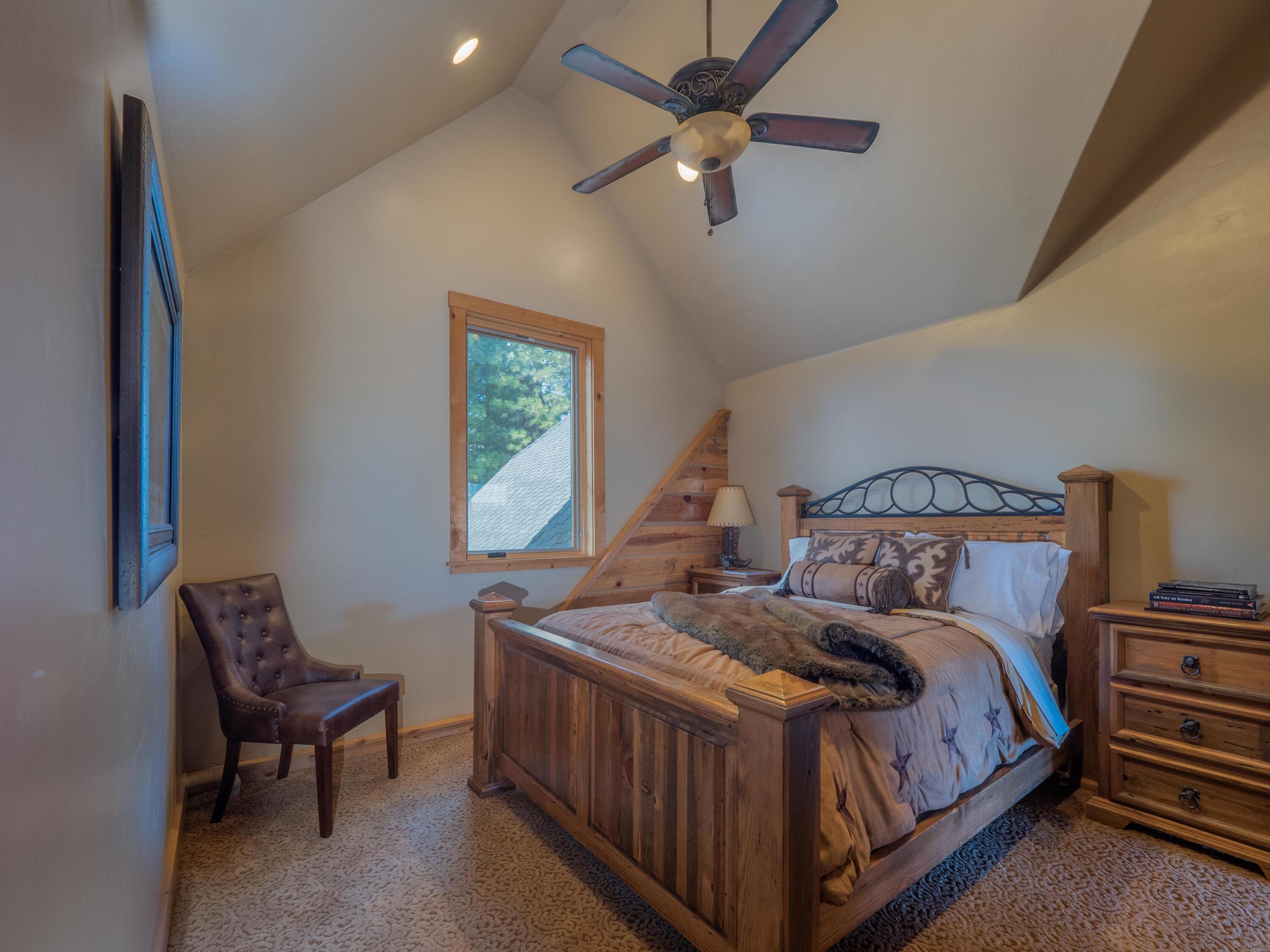 40900 Brown Road Fall River Mills, CA 96028 - Photo 28 of 72 a bed sitting in a bedroom next to a window
