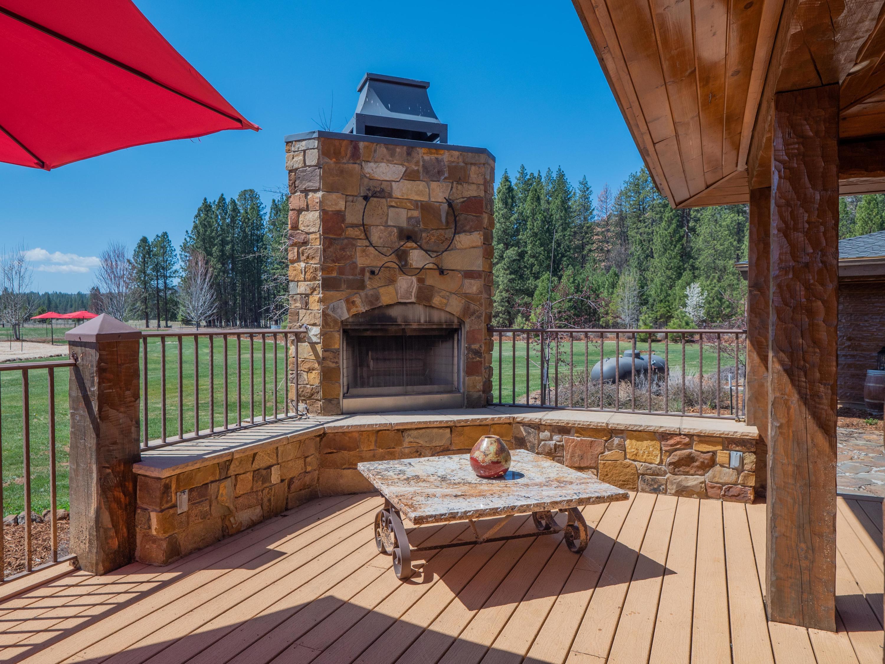 40900 Brown Road Fall River Mills, CA 96028 - Photo 33 of 72 a view of a roof deck with wooden floor and fence