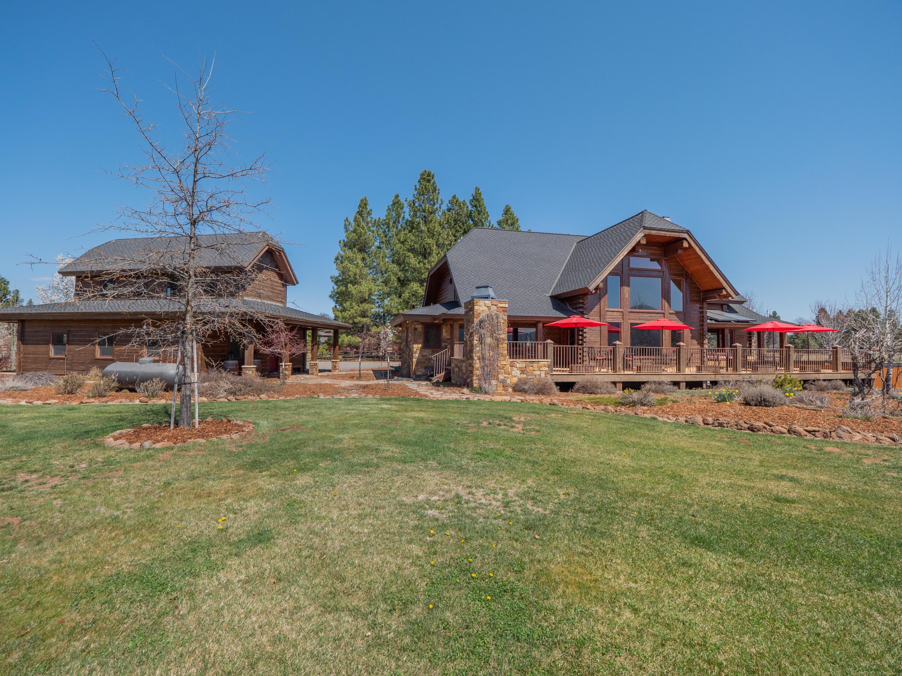 40900 Brown Road Fall River Mills, CA 96028 - Photo 49 of 72 a front view of house with outdoor space and seating area